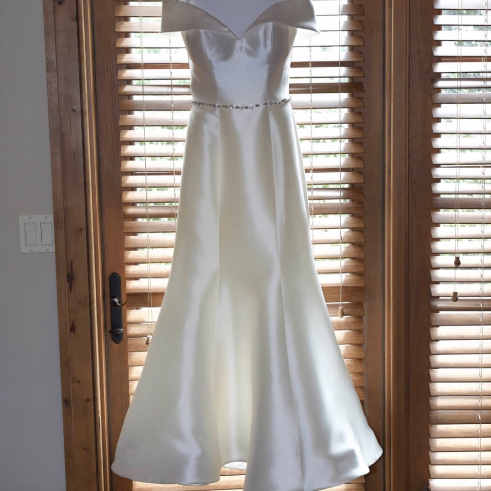 Rebecca Ingram ivory wedding dress.